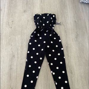 New York and company strapless romper. Black and white polka dot size XS.